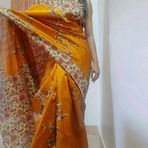 Beautiful Golden coloured floral silk Saree with lace