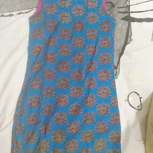 PEACOCK GREEN KURTI WITH INTRICATE DESIGNS