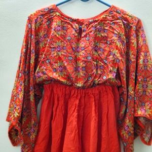 Printed Orange Top With Cut-out Cape Sleeves