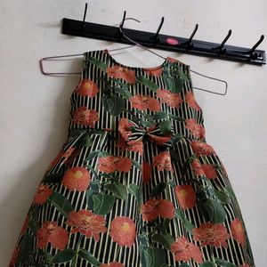 BLACK STRIPS WITH FLOWER CHARM FROCK