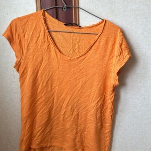 An Orange Casual Top