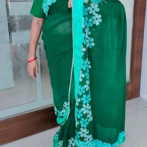 Bottle Green Floral Bordered Saree