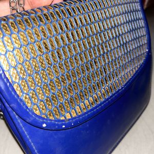 Gold Toned Blue Bag