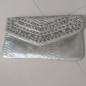 Diamonds embellished silver classic clutch