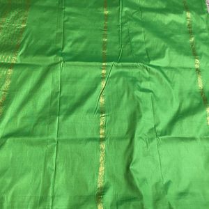 Green saree without blouse with zaree work