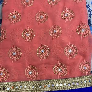 Coral And Blue Georgette Heavy Work Saree