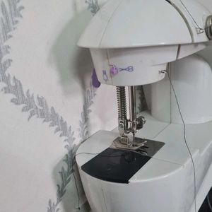 Mini Sewing Machine.