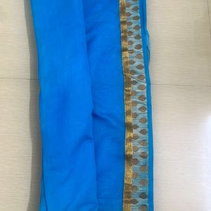 Blue Saree With Golden Border