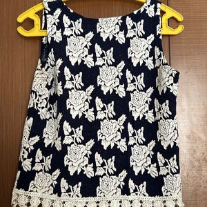 Sleeveless Top With Hanging Design