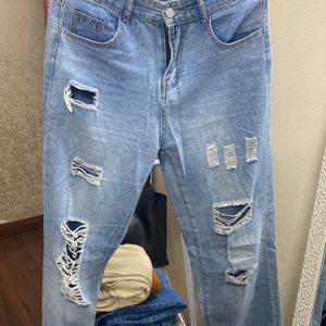 Urbanic ripped straight fit jeans.