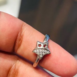 Star shaped silver Stoned ring