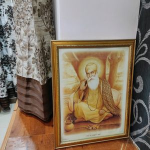 Gurunanak Photo And Laxmi Ganesh Idol