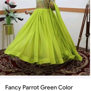 I Will Sale The Parrot Green Gown..Gown With.. Siz