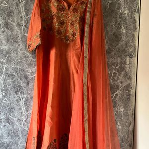 Elegant Orange Kurta Set with Embroidered Details