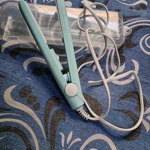 A New MINI HAIR STRAIGHTENER FOR SALE