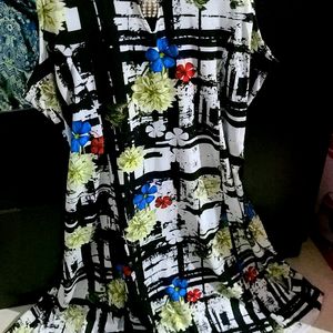 Beautiful Sleeveless White And Black Floral Dress