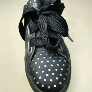 Black Puma sneakers.......