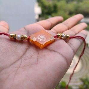 Orange Om Resin Rakhi