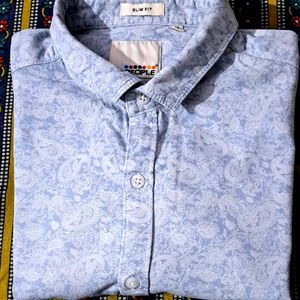 Branded printed leaf print shirt.