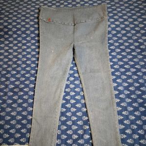 I am selling my blue-coloured jeans of size 38.