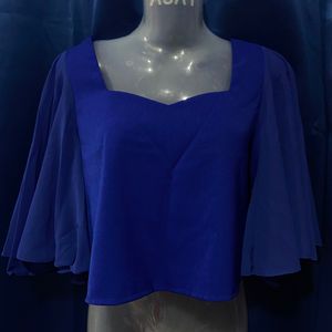 Blue Crop Top With Pretty Butterfly Sleeves.