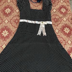 Polka Dotted Black Midi Dress