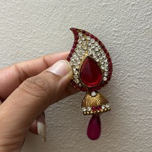 Pendant In Studded Pattern With Pink Drop Design