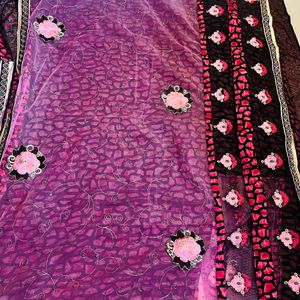 A Beautiful Pink Black Combination Floral Saree