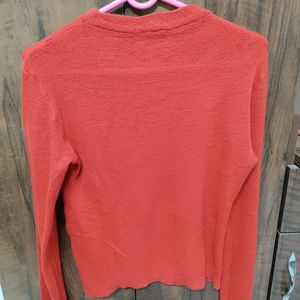 Red top with long sleeves