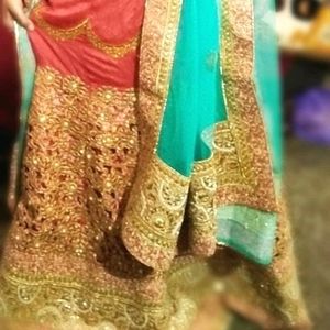 New Tranding Lengha Cholli Hot Pink With Light Green Dupta . Heavy CUT work & Stone With Hand Work.Best Quality