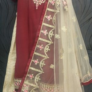 heavy Embroieded Maroon And Golden Plazo Suit