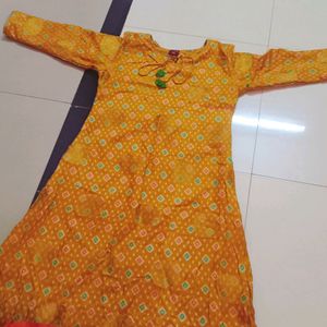 Orange / Ochkar Yellow Kurti And Leggings.