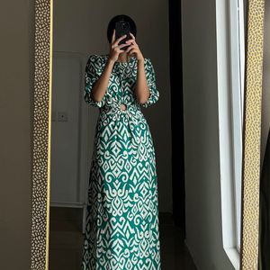 Printed Cut Out Ring Ruched Maxi Dress