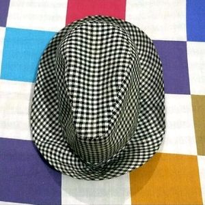 IT IS A BLACK AND WHITE COLOR BUCKET HAT.....