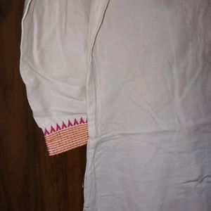 A White Kurti With Pink Border