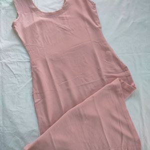 Peach Coloured Straight Sleeveless Kurti