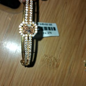 New bracelet gold shine unused