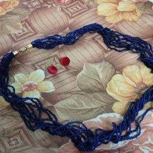 Blue Necklace And Red Velvet Earings.