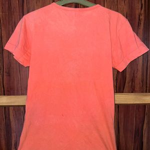 Orange colour Tshirt with pocket.