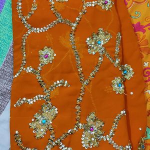 embroidered heavy orange saree