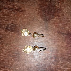 Short Gold Polished earrings.