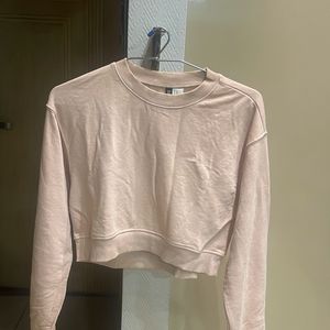 baby pink sweatshirt