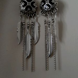 Silver Earrings In Black Effect