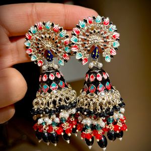 New Piece Peacock earrings