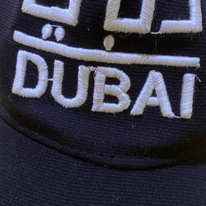 The Original stretchable “DUBAI”  hat featuring stretchable sweatband technology is a perfect blend of style.