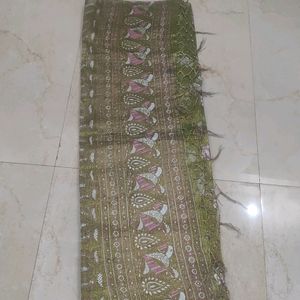 Green Colour Tissue Saree With Blouse Piece