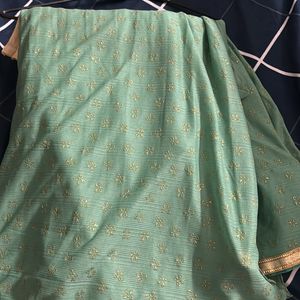 Sea Green Color Saree With Golden Blouse