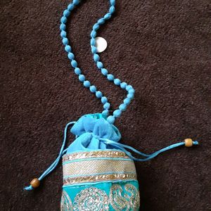 BeautifulPotli Bag💙 And A Pair Of Golden Bangles