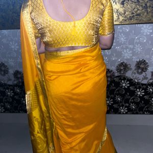 Yellow saree with blouse 1 time used only new sare