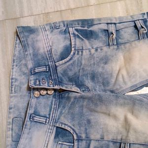 Designer jeans with multiple buttons